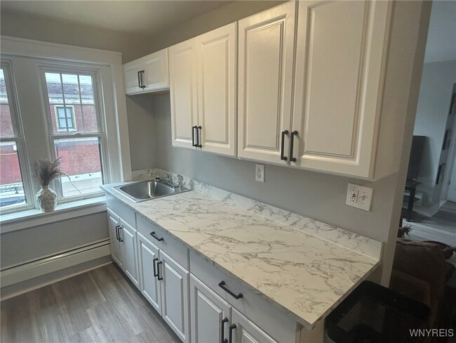 Building Photo - 1225 Hertel Ave