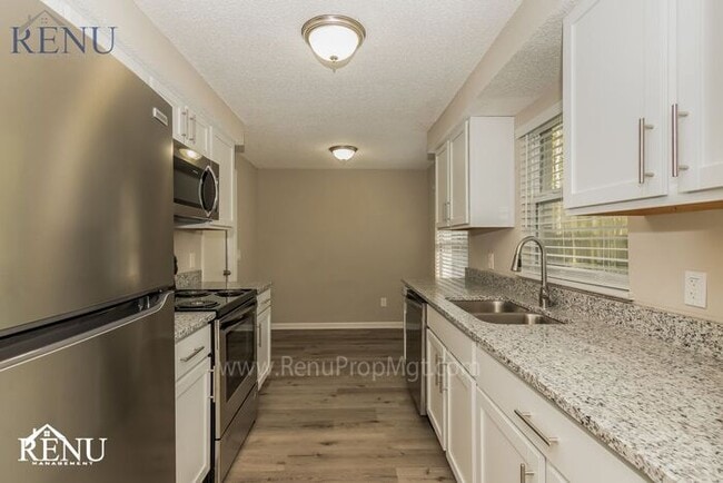 Building Photo - This Summer Special is Heating Up!: 50% of...