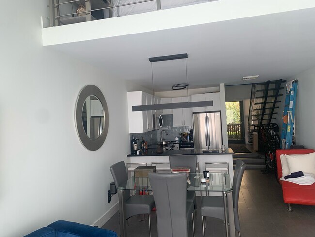 Kitchen, dining room , loft bedroom... - 3589 S Ocean Blvd