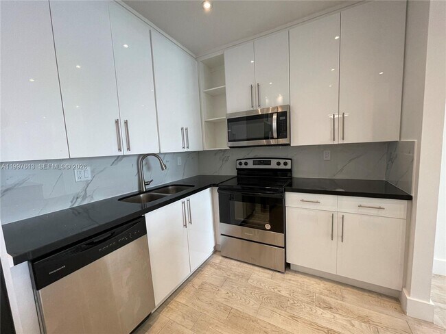 Building Photo - 19390 Collins Ave