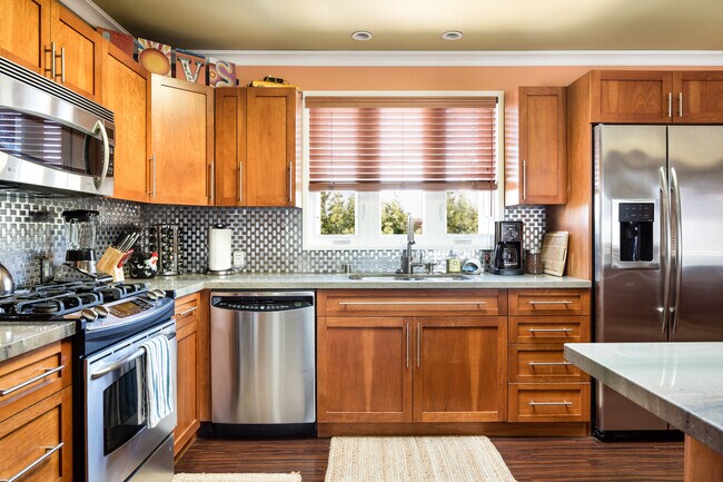 Sunny kitchen window and huge skylight provides plenty of natural light - 3745 Ocean View Ave