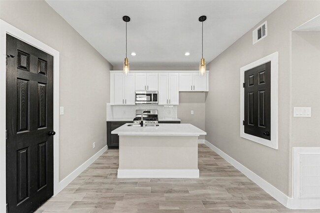 Building Photo - 8221 Flaxman St
