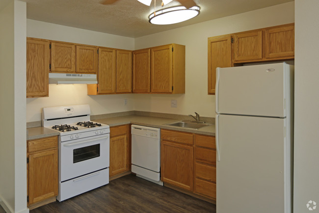 Updated Kitchens w/ Gas Stove - Goldstone Place Apartments