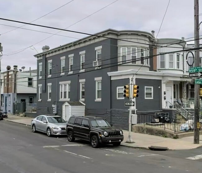 Building Photo - 5861 Cedar Ave