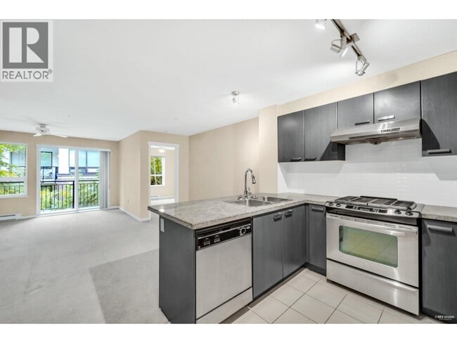 Photo du bâtiment - 9399-9399 Tomicki Ave