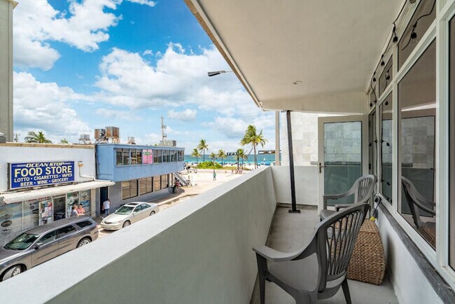 Building Photo - Beachfront Bloo's-2 Units-Ocean View Balco...