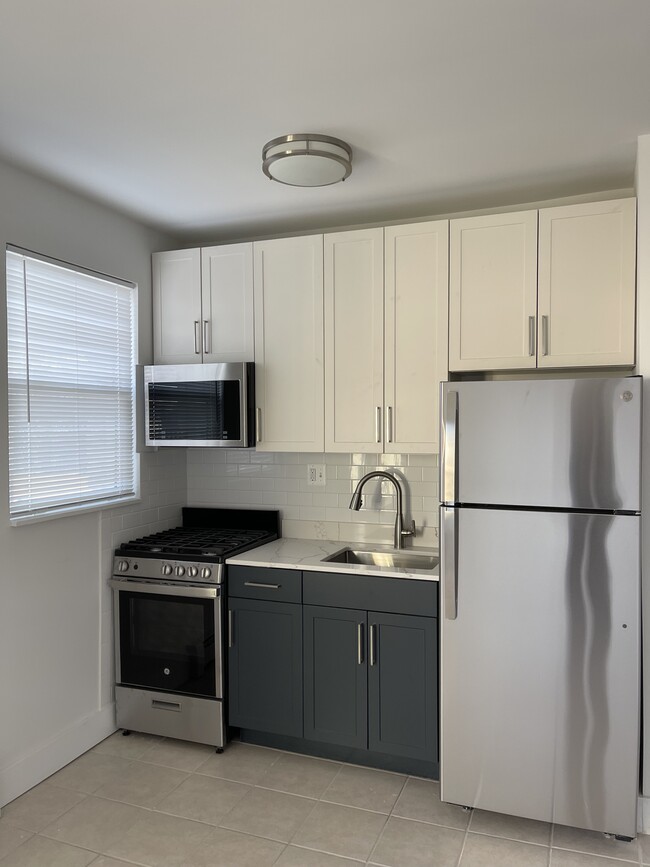 Kitchen - Blue Cabinets - 1421 12th St NW