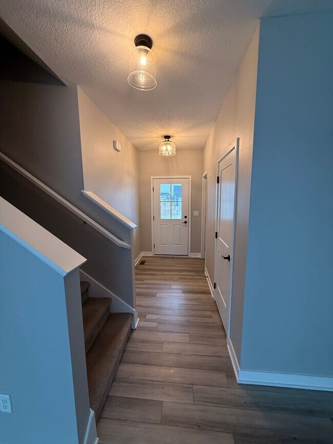 Building Photo - Spacious 4-Bedroom Home with 2-Car Garage & Yard