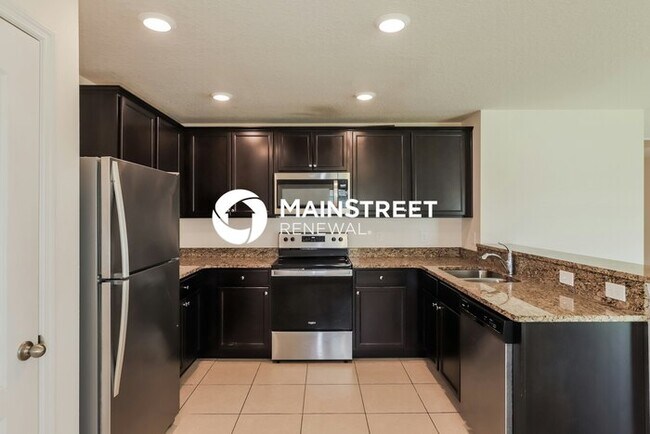 Building Photo - 4 Bedroom Pet-Friendly Home in Lakeland, FL with Main Street Renewal