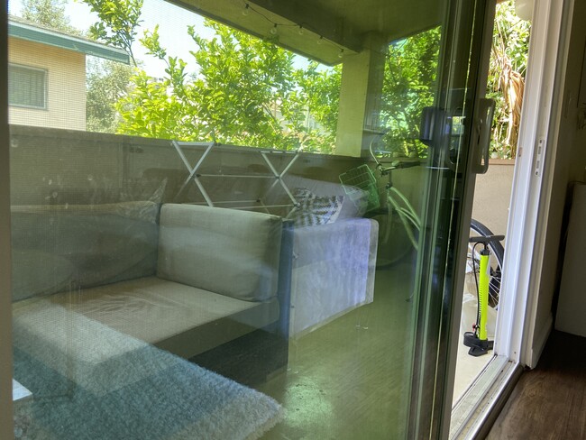 Large patio with tampered glass sliding door - 12066 Lamanda St