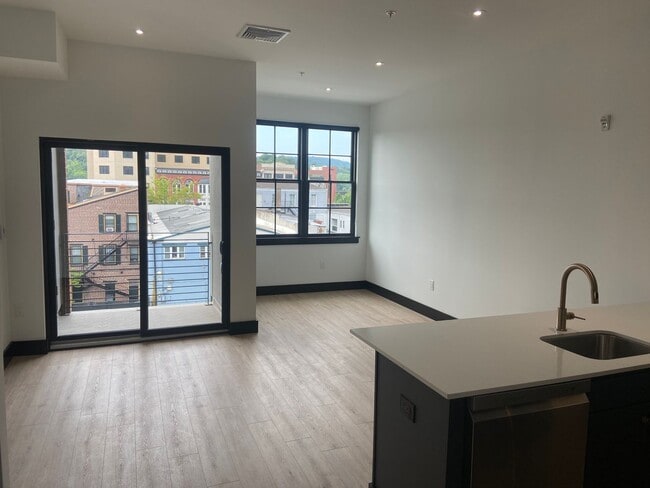 Building Photo - Stylish Studio Apartment | Watermark, Down...