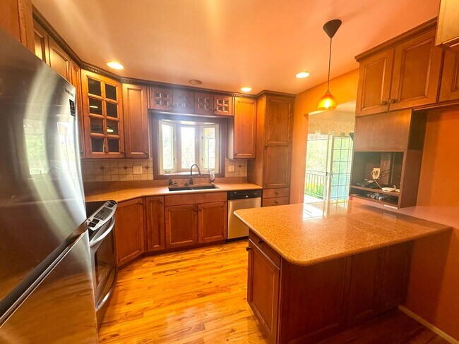 Building Photo - Spacious Eastside Home with Sunroom, EV Charging & Finished Basement!