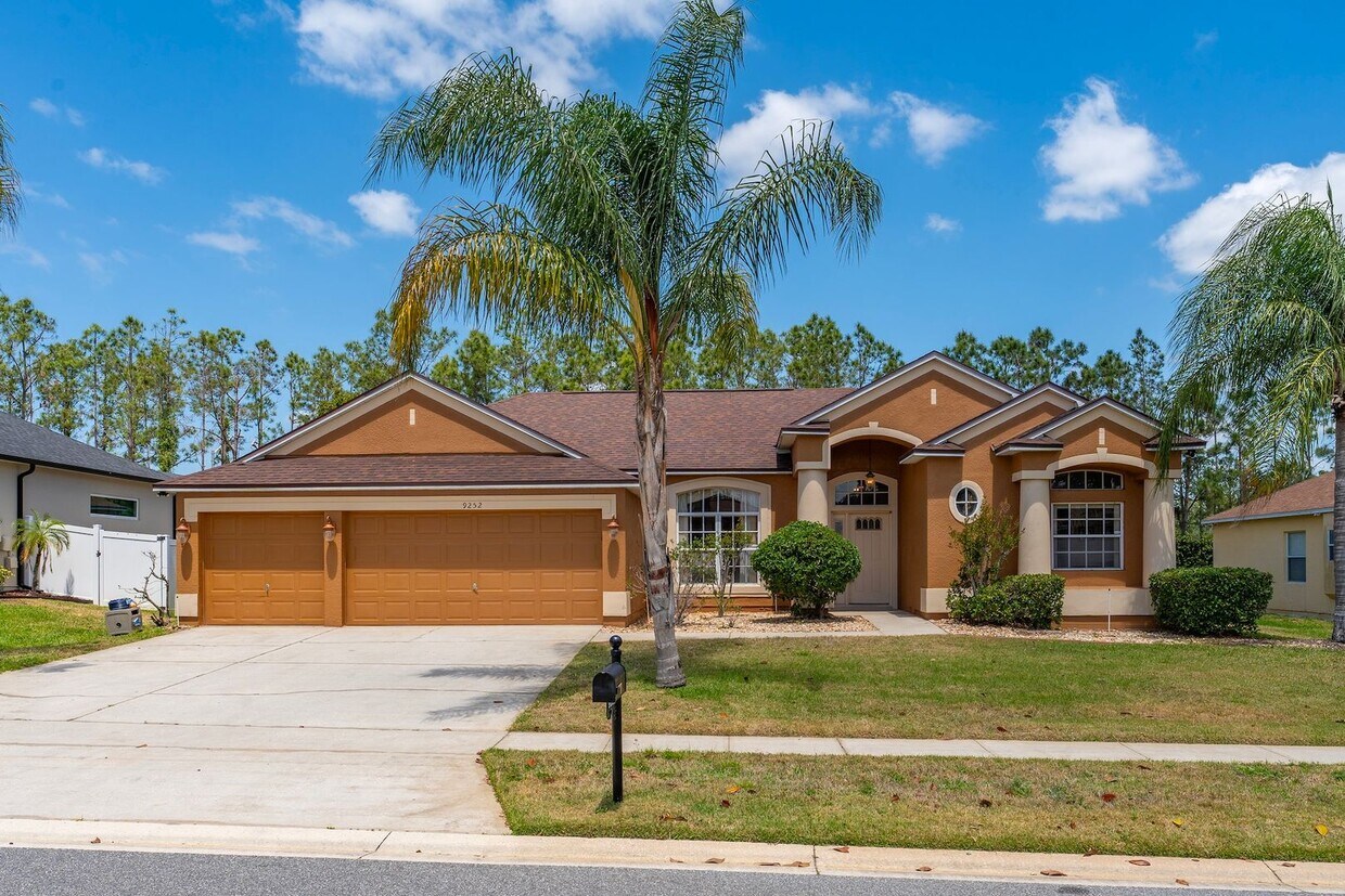 Primary Photo - Spacious 4/3 Pool Home in the Gated Lake F...