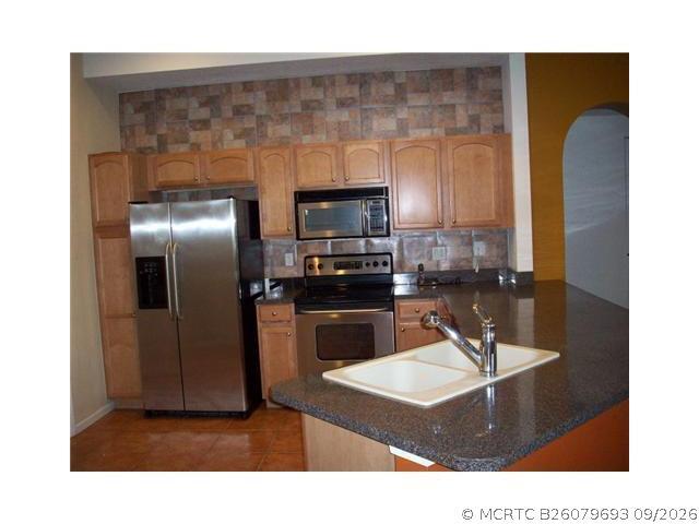Foto del edificio - 6173 NW E Deville Cir