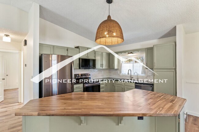 Building Photo - Updated 4 Bed, 2 Bath Home in Briargate with Mountain Views, fully fenced yard, 2 car garage and AC