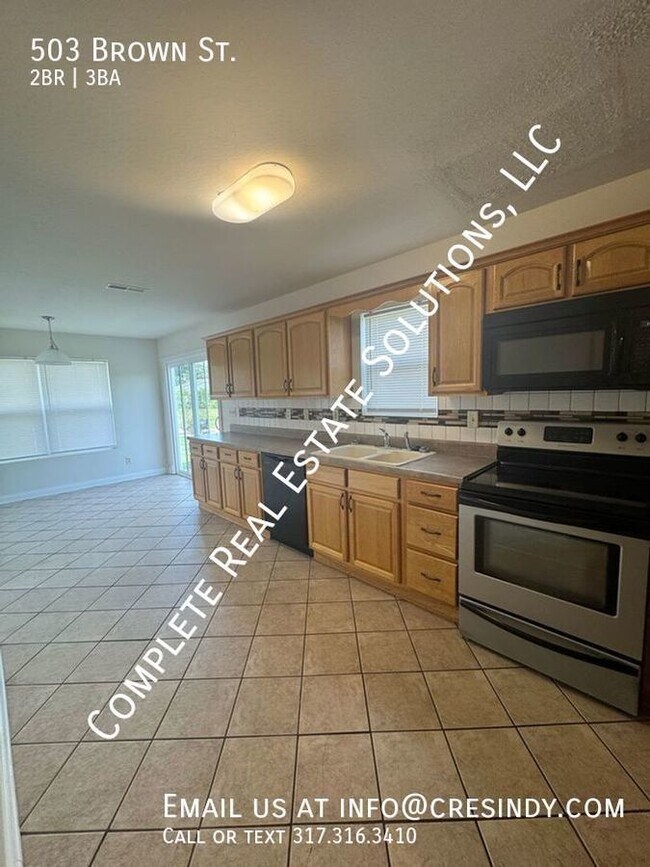 Building Photo - Now Showing this 2 bedroom, 2 1/2 bath dup...