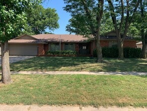 Building Photo - 8604 E Tamarac St