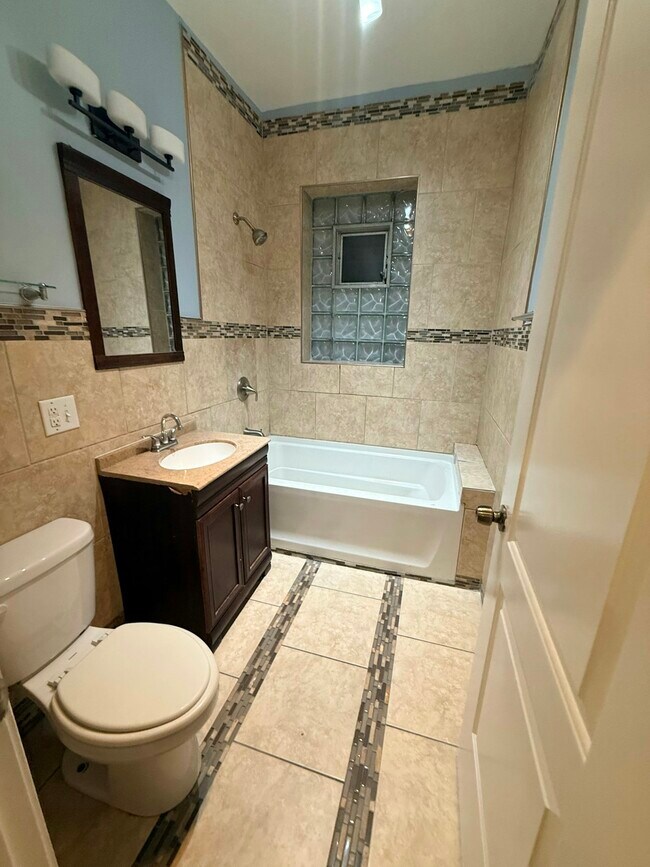 Building Photo - 7942 S Harvard Ave