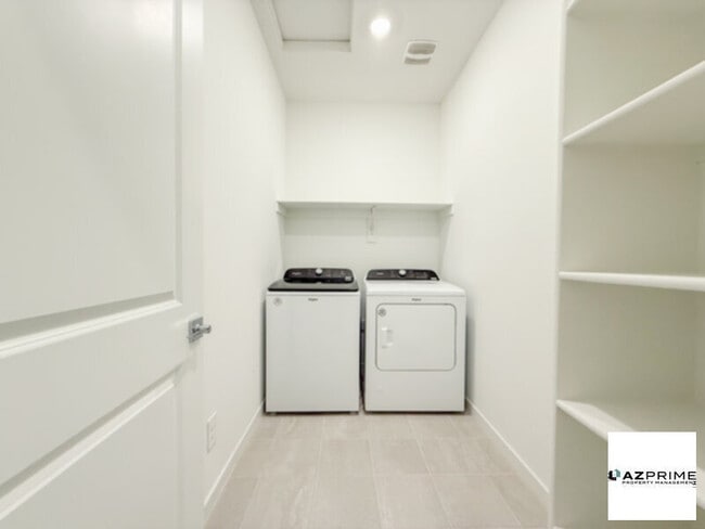 Building Photo - Live Your Best Life In This Stunning Brand-New 4/2 Goodyear Home, Where Style Meets C