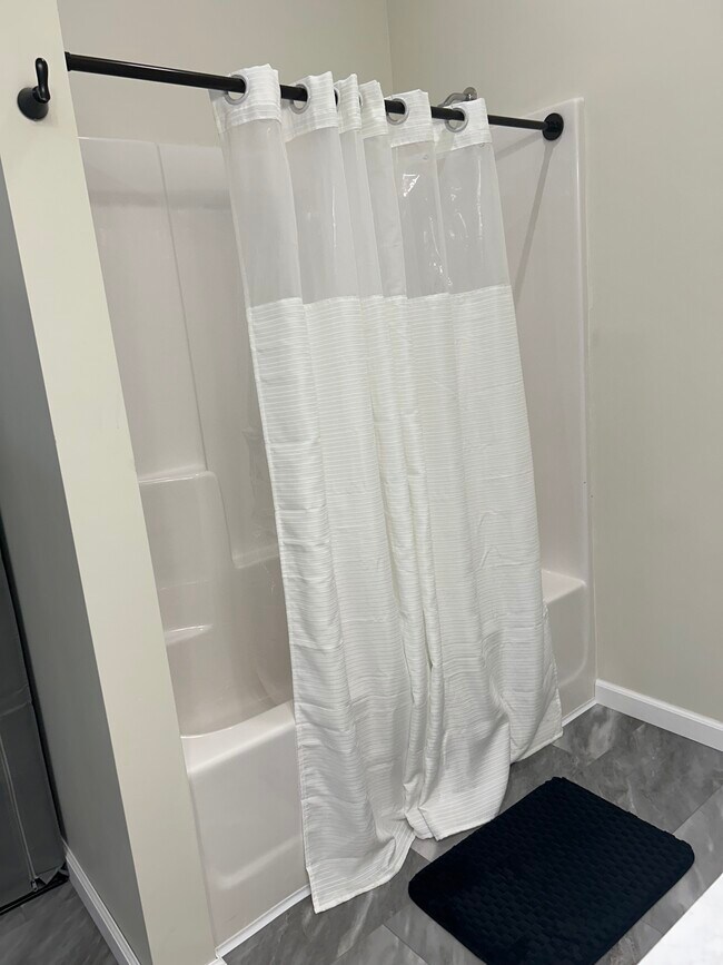 Shower with curtain - 812 Commercial St