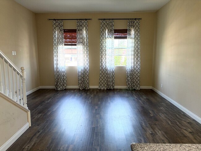 Building Photo - Stylish 3-Story Townhome with Balconies & Open-Concept Living