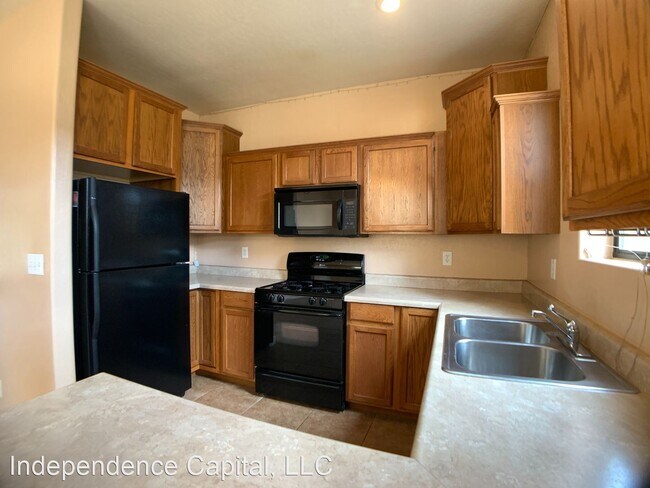 Building Photo - 3 br, 2.5 bath House - 1477 E. Turney Dr.