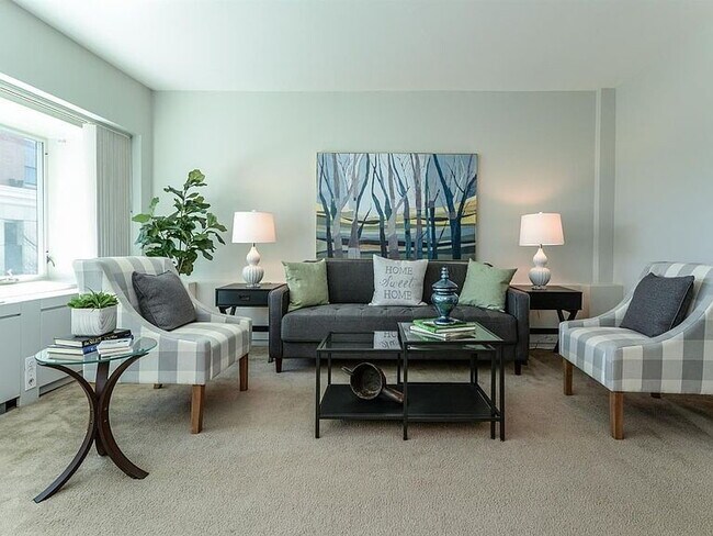 Building Photo - "Chic Urban Living: Cozy 1-Bedroom Condo w...