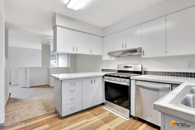 Photo - The Single-Family Alternative: 4BD/2BA Triplex Unit with Modern Comforts Apartment