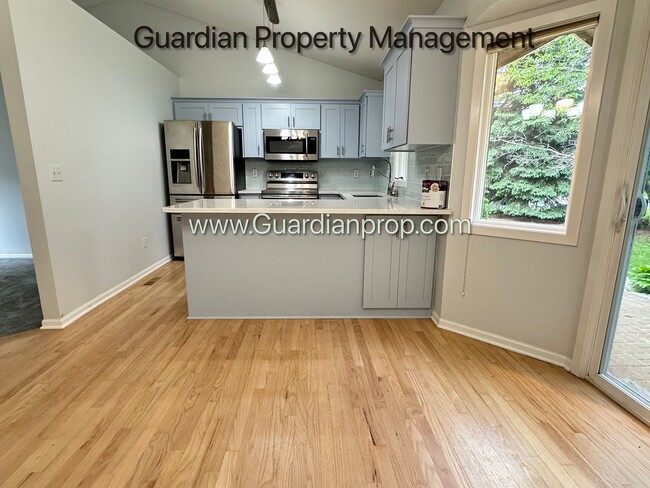 Building Photo - Maple Grove Split Level Home, Fenced Yard, 2 Car Garage, Dishwasher, W/D