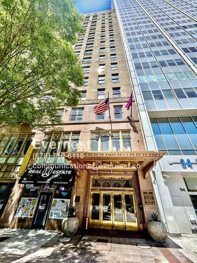 Foto del edificio - Cozy 1-Bedroom Condo with Convenient Acces...