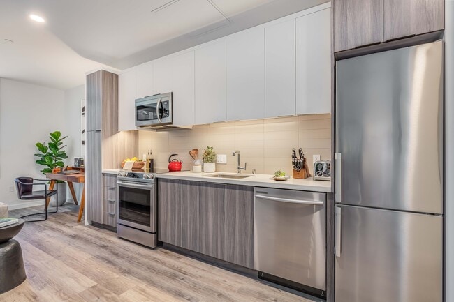 Stainless steel appliances - The Residences at Bishop Place