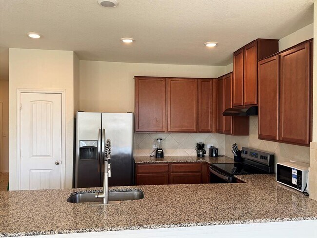 Foto del edificio - 7607 Lazy Creek Dr