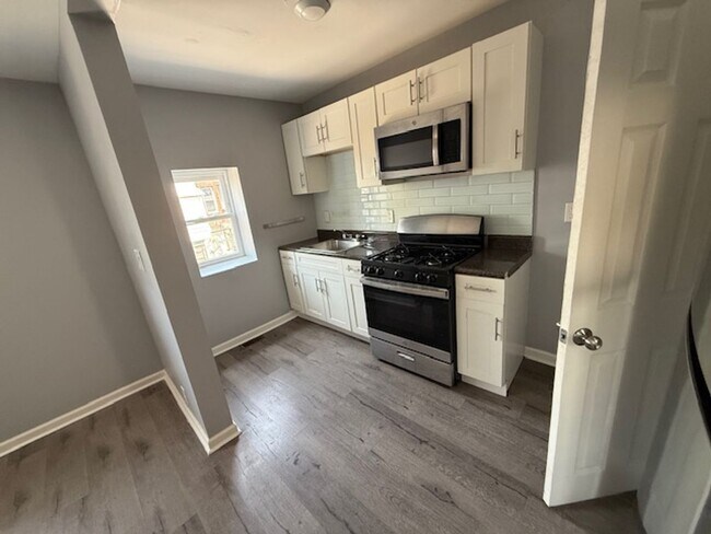 Building Photo - Renovated 3-Bedroom Home with Porch Front ...