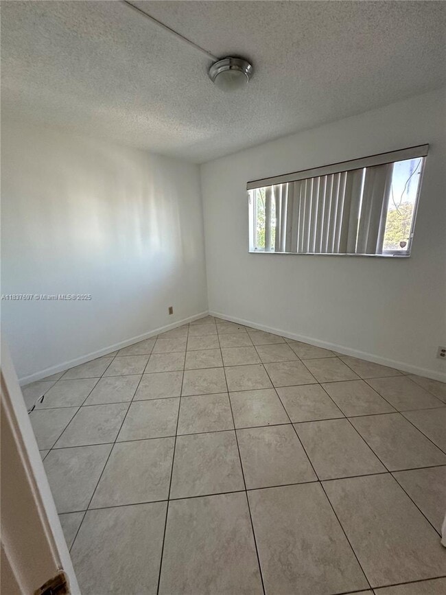 Building Photo - 8740 N Sherman Cir