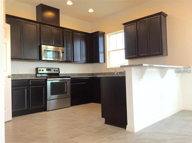 Building Photo - 9350 Woodcrane Dr