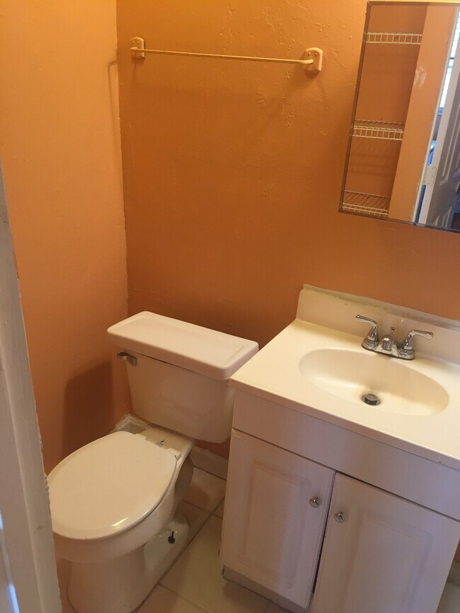 Basics. Medicine cabinet. Ceiling vent fan. - 1300 Jeronimo Drive