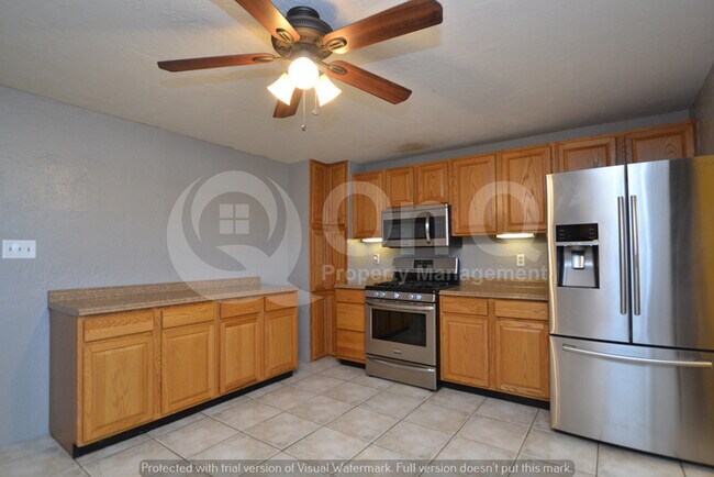 Building Photo - 4 Bedroom 2 Bath Home! DUAL RV gates!