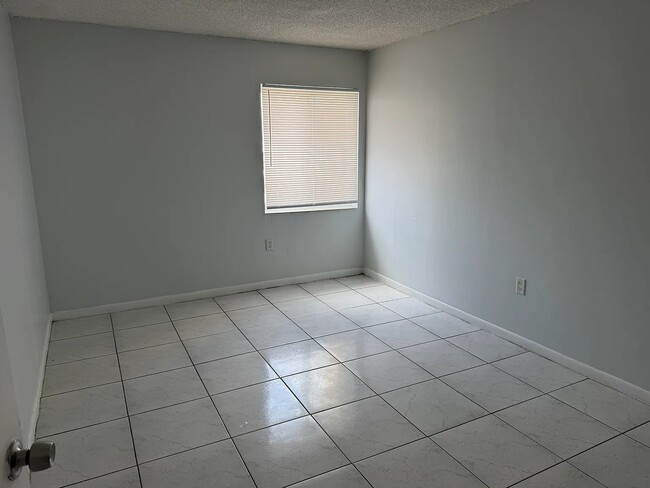Building Photo - 525 NW 62 Ave
