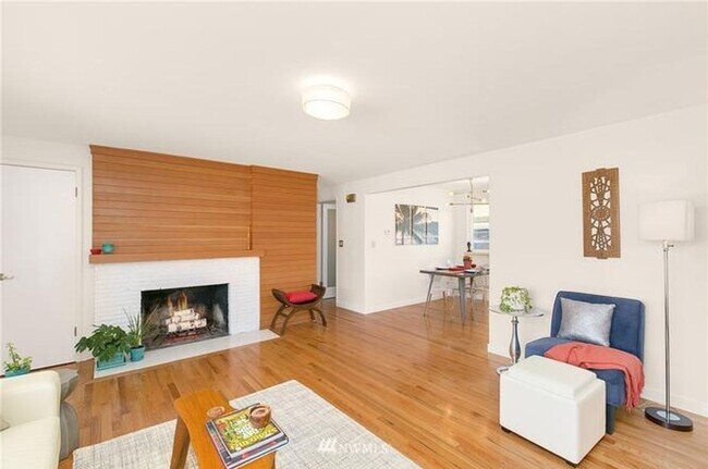 Building Photo - Midcentury Modern Rambler with Designer Kitchen & Spacious Fenced Yard