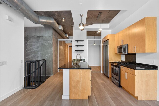 Building Photo - Stunning Contemporary Loft with High Ceilings & Modern Finishes