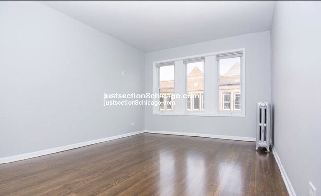 Building Photo - 7238 S Cornell Ave