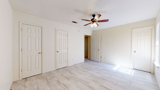 Building Photo - ALL TILE 3 BEDROOM DUPLEX ONLY $1,350 + 2 ...