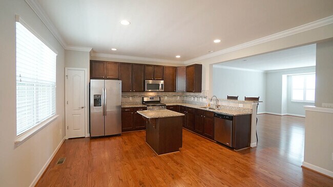 Kitchen with view of Living Room - 1207 Heritage Links Dr