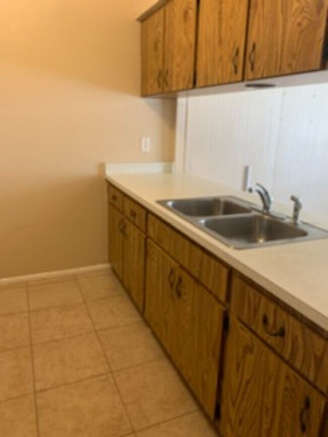 Building Photo - Two Bedroom One And a Half Bath Townhome -...