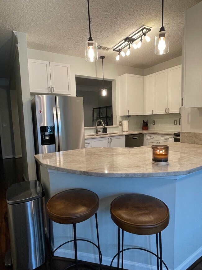 Kitchen. New countertops and new fridge. - 401 16th St NW