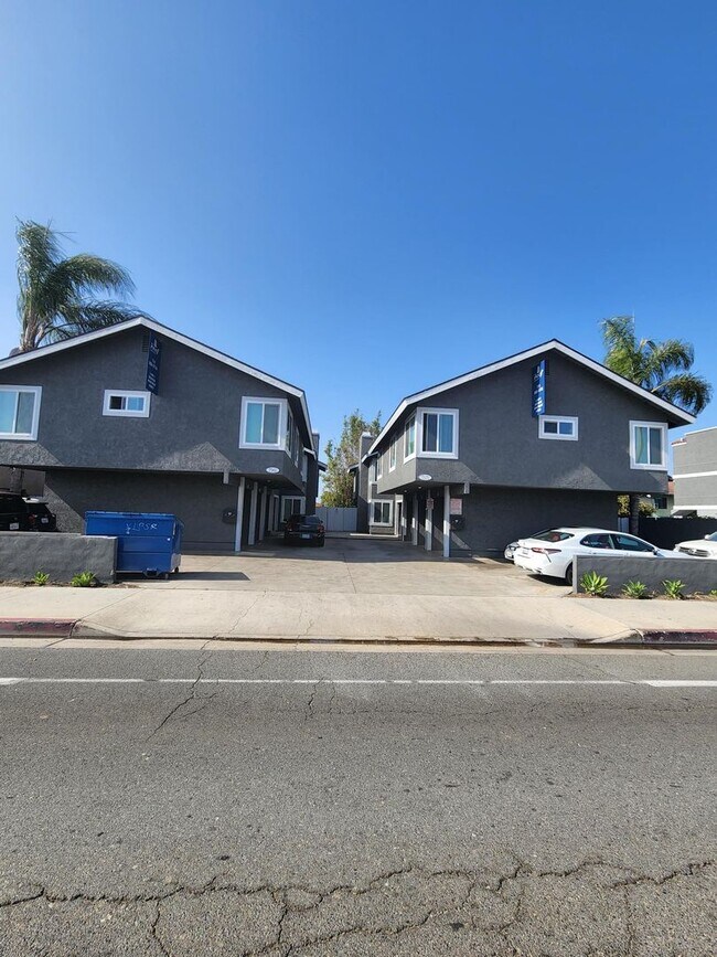 Building Photo - 7571-7571 Warner Ave