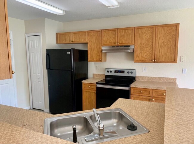 Foto del edificio - Cozy 4 Bedroom Poinciana Home