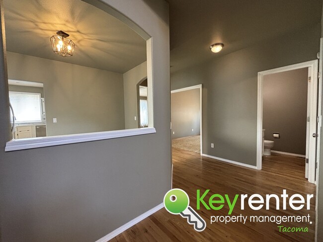 Building Photo - Elegant Browns Point Living with Backyard ...