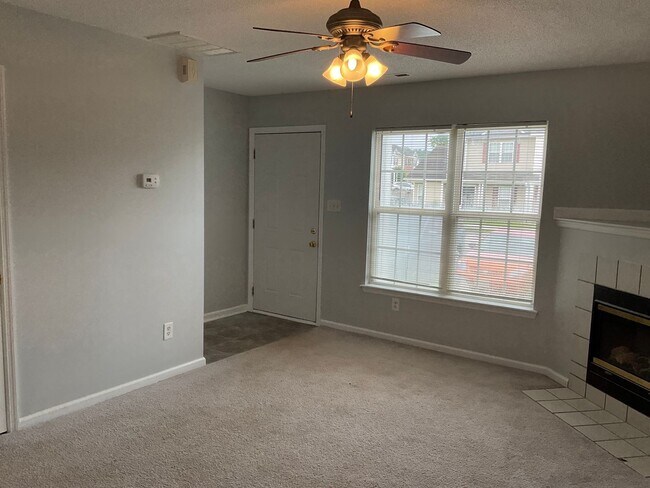 Building Photo - Charming two bedroom two and a half bath town home that is centrally located! Minutes to Camp Lej...