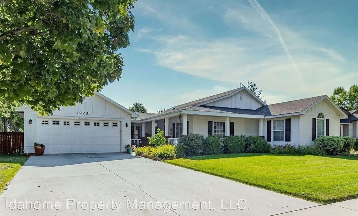 Foto principal - 3 br, 2 bath House - 4929 W Ravenscroft St